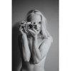 Young woman taking pictures with a Leica M4